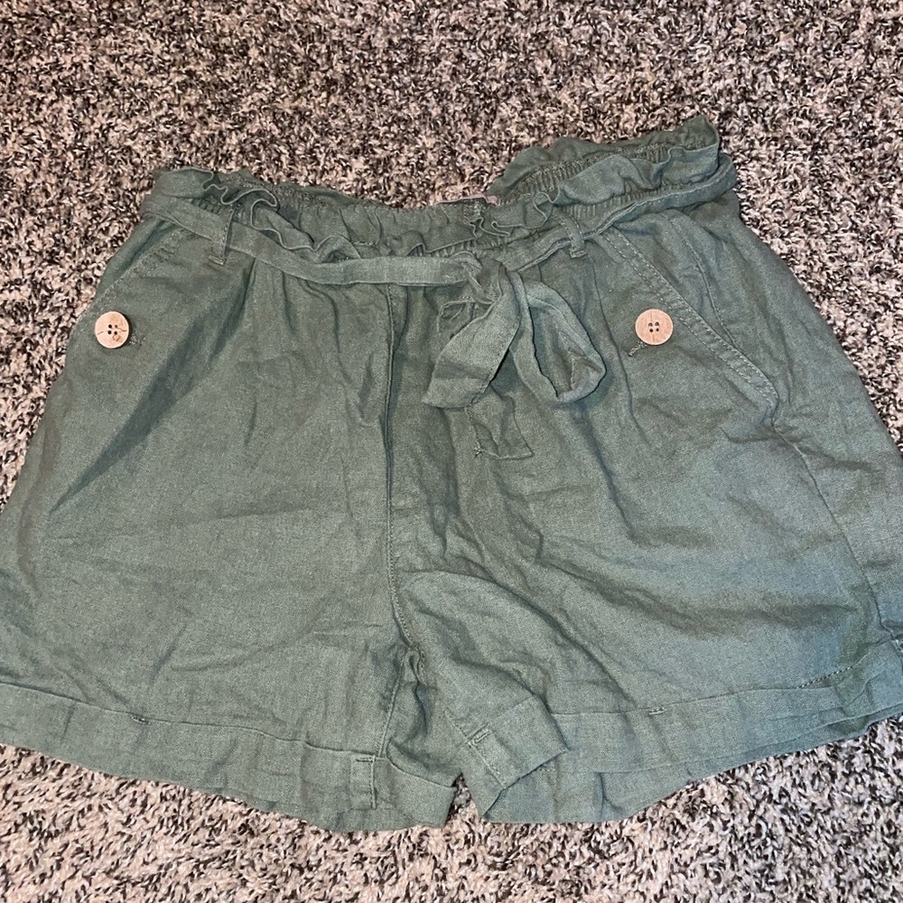Small green stretch shorts from Maurice’s with matching belt.